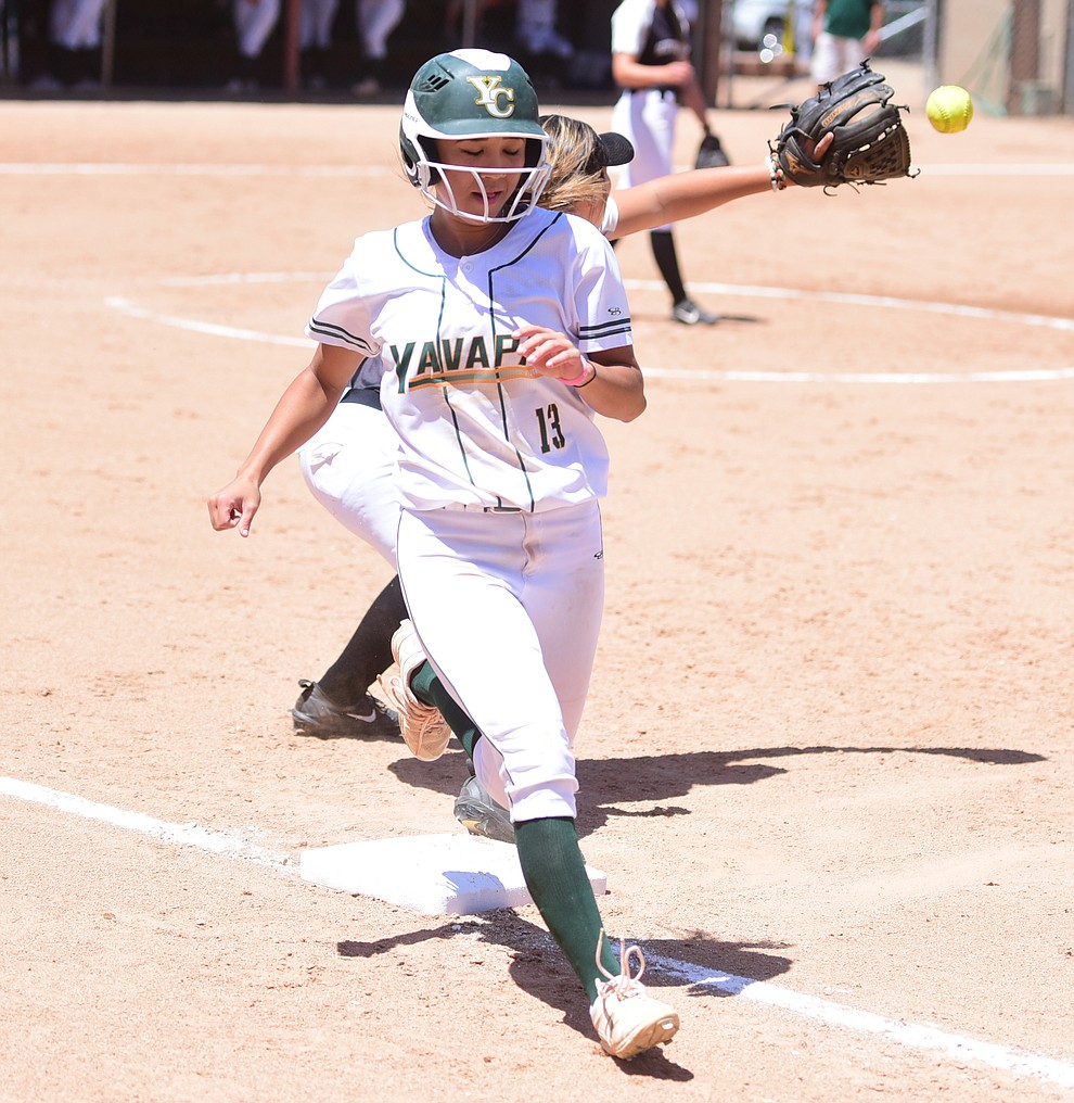 Yavapai's Shayna Ige beats the throw to first as they faced Scottsdale Community College Saturday, April 22 in Prescott.