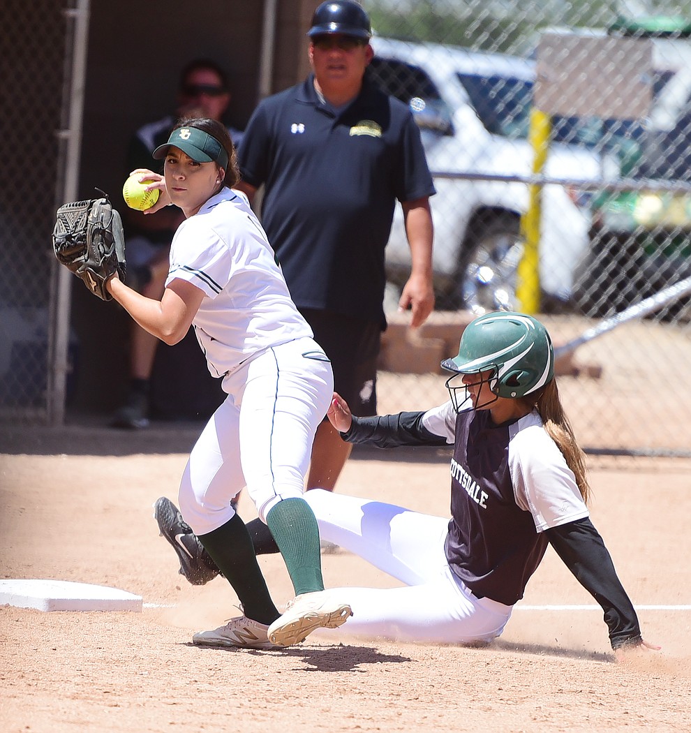 Yavapai's Karissa Pena gets the force at third and throws to first for the double play as they faced Scottsdale Community College Saturday, April 22 in Prescott.