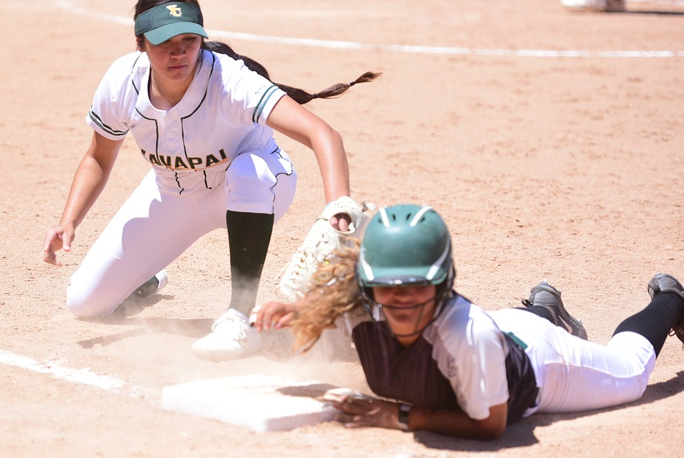 Yavapai's Andrea Sotelo tries to get the pick off out as they faced Scottsdale Community College Saturday, April 22 in Prescott.