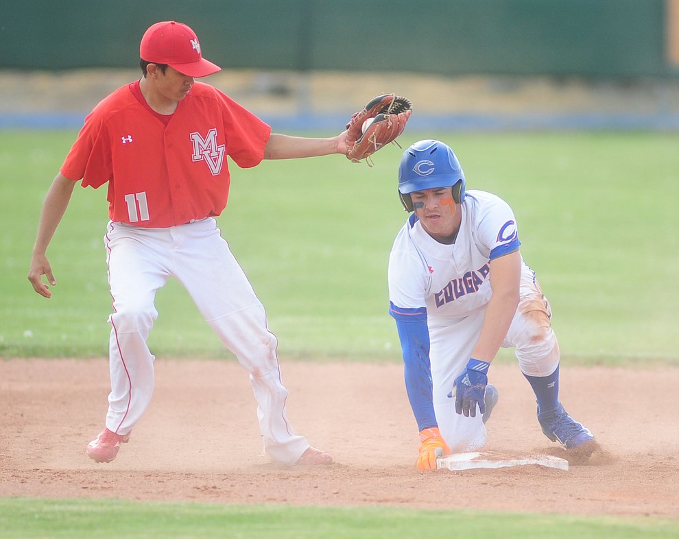 Chino Valley's Jayden Loftin slides safely into second base as they play Monument Valley in a play-in game at Chino Valley for the Arizona Interscholastic Association's State Baseball Tournament Wednesday, April 26.  (Les Stukenberg/Courier)
