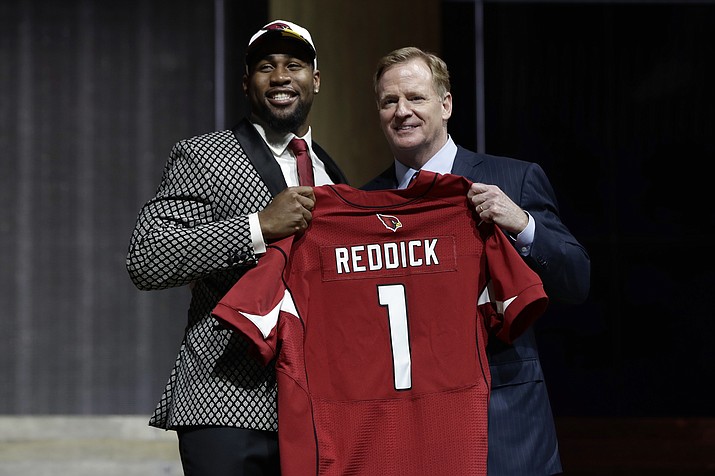 Temple’s Haason Reddick, left, poses with NFL commissioner Roger Goodell after being selected by the Arizona Cardinals during the first round of the 2017 NFL Draft on Thursday, April 27, in Philadelphia. (Matt Rourke/AP)