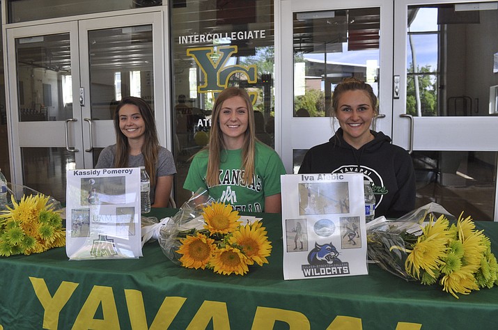 Three players from the Yavapai College volleyball team signed a letter of intent to move on to a four-year school and continue their careers April 30 in Prescott. Jordan Tilley, left, committed to Cal State-Stanislaus; Kassidy Pomeroy, middle, committed to the University of Arkansas-Monticello; and Iva Alebic committed to Culver-Stockton College. (Yavapai Athletics/Courtesy)
