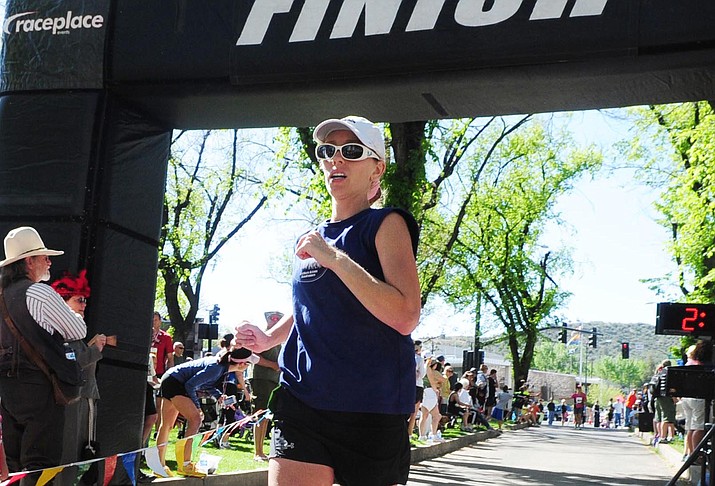 Tanaya Gallagher, from Sedona, wins the women’s Whiskey Row Marathon on May 4, 2013, in Prescott. (Les Stukenberg/Courier, File)