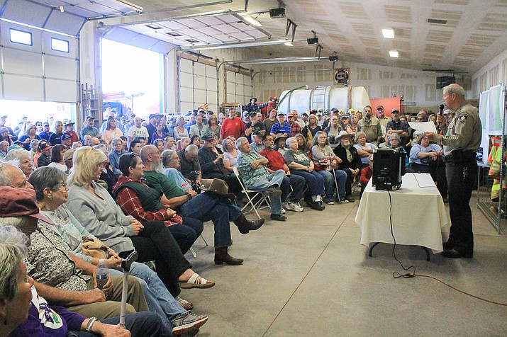 Coconino County Sheriff Jim Driscoll addresses a crowd at High Country Fire Rescue on May 6. Driscoll answered questions about burglaries and a recent double homicide that occurred in the Red Lake area.