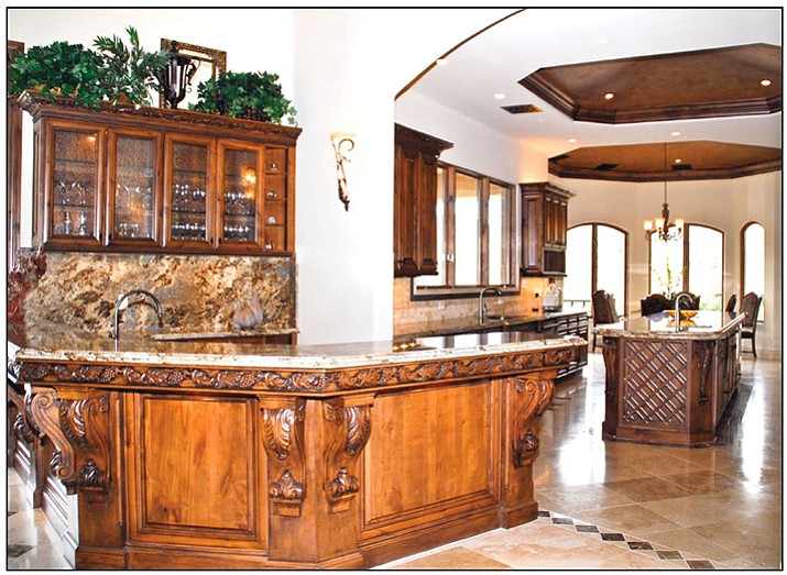 Elegant custom cabinets for a custom space because of the shape of the room.