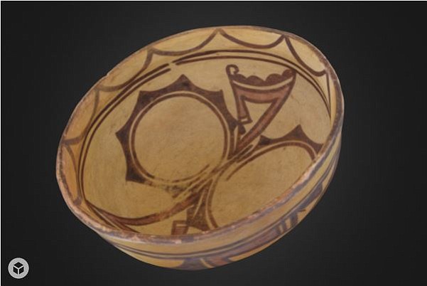 A Hopi bowl, crafted in the 1960s, demonstrates how the Hopi style of pottery has evolved over thousands of years when viewed alongside earlier examples. 