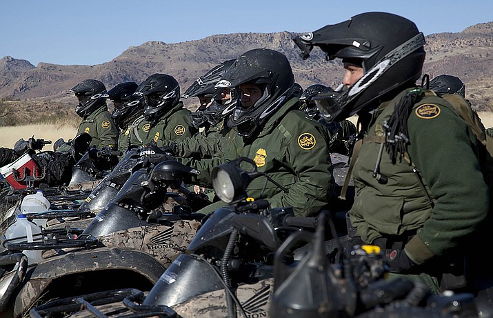 Border Patrol agents line up in formation on motor bikes in the Tucson sector. A Senate committee gave preliminary approval to a measure that would lift a lie detector requirement of some Border Patrol applicants, as the agency works to hire thousands of officers. (Photo by Josh Denmark/Customs and Border Protection)
