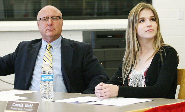 As student body president, Mingus Union High School senior Cassia Gehl attends the monthly meetings of the school district’s governing board. Gehl is pictured with Kirk Waddle, business manager with Mingus Union High School District. (Photo by Bill Helm)