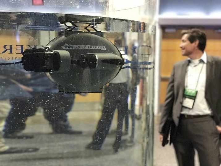 An underwater drone is seen in a tank at the Special Operations Forces Industry Conference in Tampa, Fla. The conference is for military special operations forces featuring gadgets, weapons and tools. (AP Photos/ Tamara Lush)