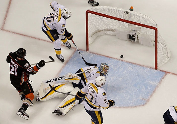 Anaheim Ducks right wing Chris Wagner (21) scores against Nashville Predators goalie Pekka Rinne during the second period of Game 5 in the NHL hockey Stanley Cup Western Conference finals in Anaheim, Calif., Saturday, May 20, 2017. (AP Photo/Chris Carlson)