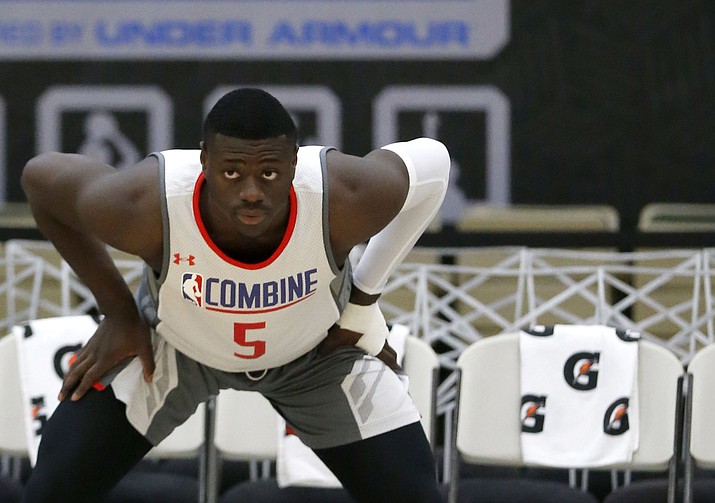 Rawle Alkins, from Arizona, loosens up during the NBA draft basketball combine Thursday, May 11, 2017, in Chicago. (Charles Rex Arbogast/AP)