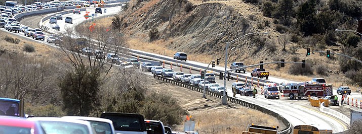 In this Feb. 9, 2011, file photo, two separate collisions on Highway 69 near Diamond Drive backed up traffic in both directions. Emergency crews transported one person with head injuries to Yavapai Region Medical Center in Prescott Valley where the 28-year-old was then flown by helicopter to John C. Lincoln Hospital in Phoenix. (Les Stukenberg/Courier, File)