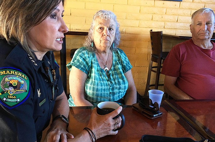Camp Verde Marshal Nancy Gardner, pictured, and Animal Control Officer Stave Ganis talk with Camp Verde residents Monday, May 22 at Thanks a Latte during the department’s monthly Coffee with a Cop. (Photo by Bill Helm)