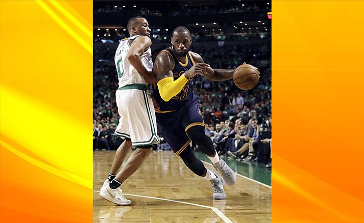 Cleveland Cavaliers forward LeBron James, right, drives against Boston Celtics guard Avery Bradley during the second half of Game 5 of the NBA basketball Eastern Conference finals, on Thursday, May 25, 2017, in Boston. (AP Photo/Elise Amendola)