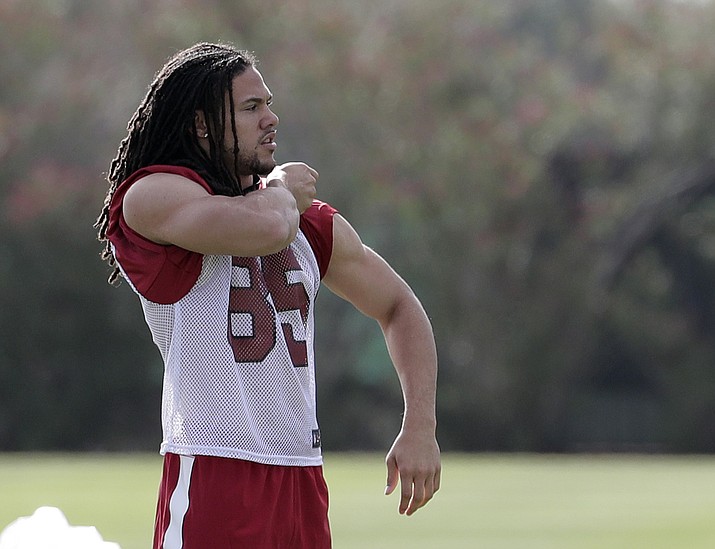 Arizona Cardinals’ Krishawn Hogan prepares for a NFL football voluntary team workout May 16 in Tempe. Just a few years ago, Hogan was pushing a broom at Lucas Oil Center, sweeping up the site of the NFL Draft Combine. (Matt York/AP)