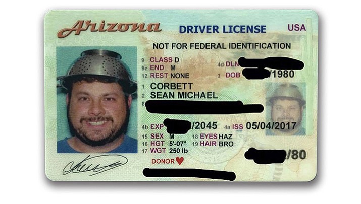 In a driver's license photo dispute with the Arizona Department of Transportation, 37-year-old Sean Corbett says he is a "Pastafarian," part of the church of the Flying Spaghetti Monster which says the world was created 5,000 years ago by a Flying Spaghetti Monster."  The Chandler man claims his colander is religious headwear and therefore should be allowed on his driver's license photo.