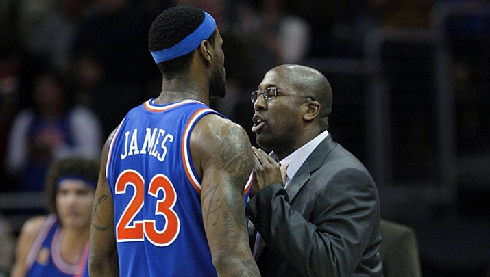 In this Dec. 11, 2009, file photo, Cleveland Cavaliers coach Mike Brown talks with LeBron James (23) during a game in Cleveland. Brown, Golden State Warriors well-liked top assistant, whose first stint as a head coach was to nurture a young LeBron James, is heading to Cleveland, the city that shaped him more personally and professionally than any other. 