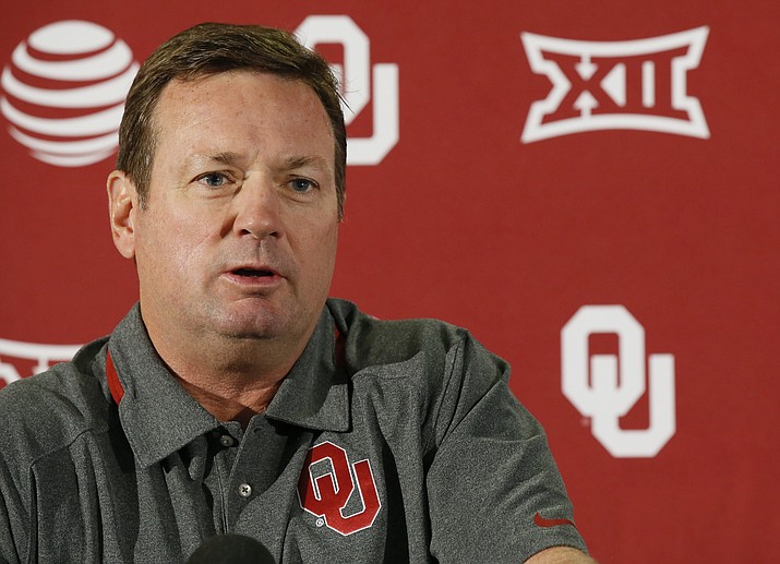 Oklahoma’s Bob Stoops announced he decided to retire as the Sooners football coach after 18 seasons that included the 2000 national championship and 10 Big 12 Conference titles. (Sue Ogrocki/AP, file)