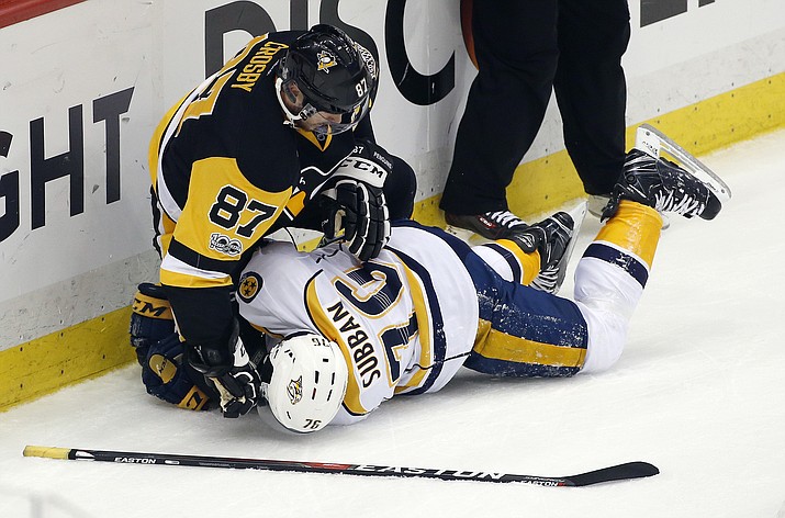 Pittsburgh Penguins’ Sidney Crosby (87) tangles with Nashville Predators’ P.K. Subban (76) during the first period in Game 5 of the NHL hockey Stanley Cup Final, Thursday, June 8, in Pittsburgh. (Gene J. Puskar/AP)