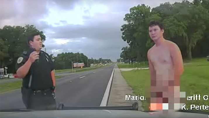 Authorities say a Florida man got out of his car after a crash, stripped off his clothes, walked away from the scene and then damaged a door of the responding deputy's patrol car.