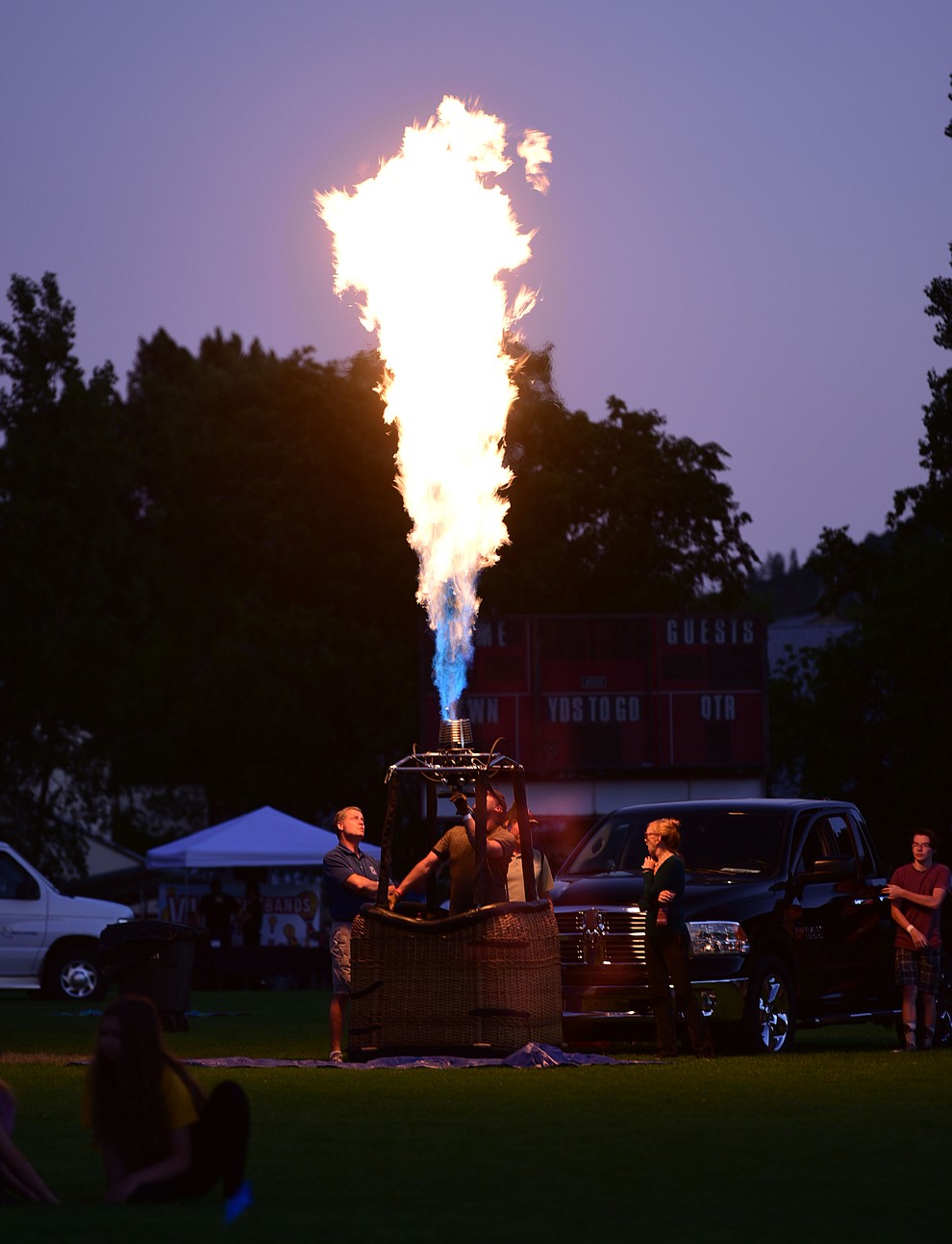 Ballonists light up their burners at the inaugural Arizona Craft Distillers Guild Festival and Balloon Glow Friday, June 9 on the football field at Prescott Mile High Middle School.  (Les Stukenberg/Courier)