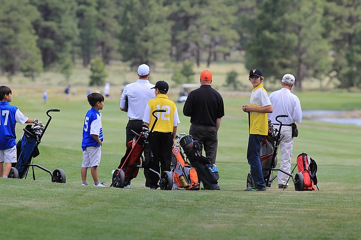 The Elephant Rocks junior golfers prepare at the start of a match with Flagstaff June 7. 