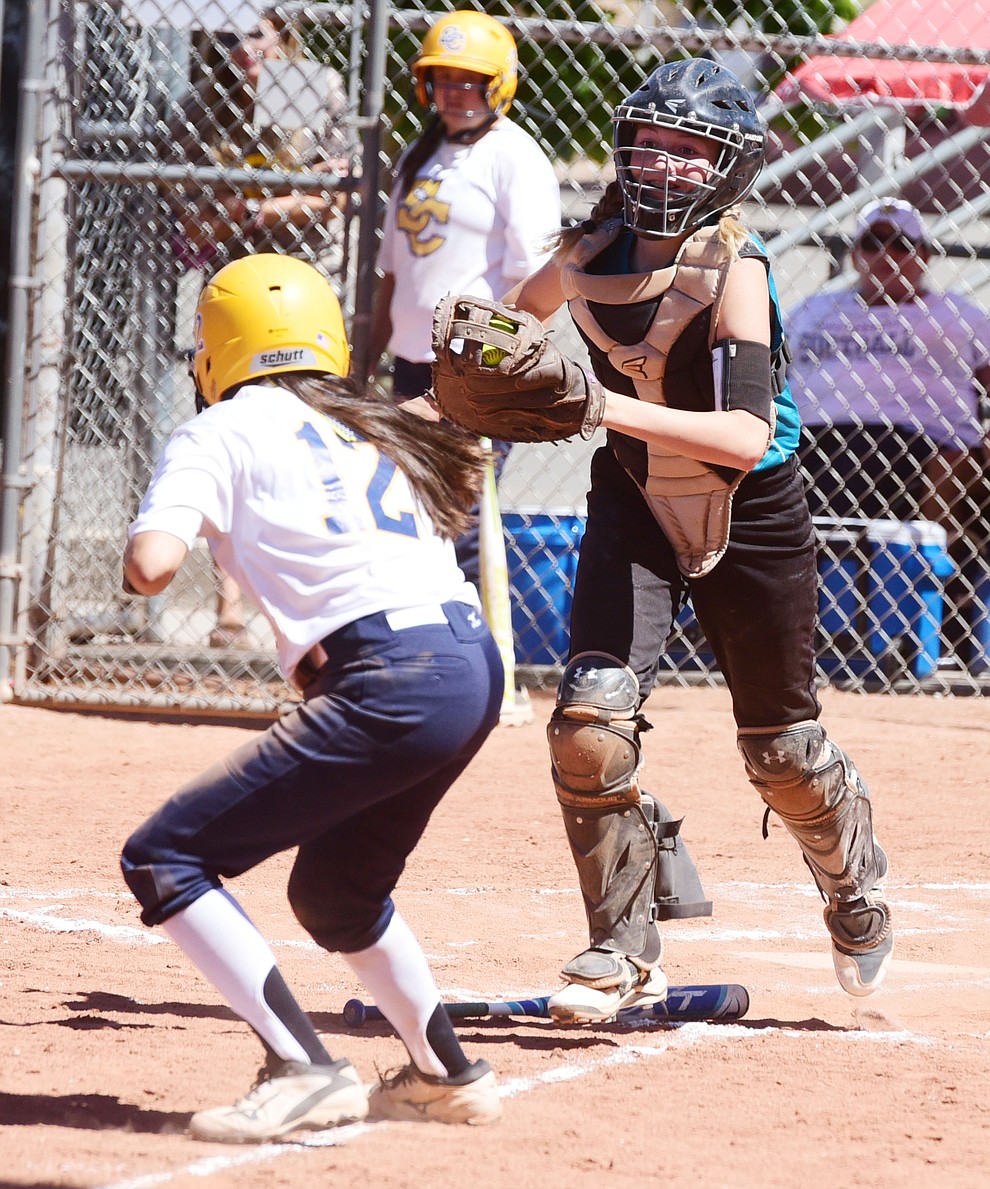 Catcher Peyton Weber makes the tag on a runner as the Arizona Sand Snakes take on the Tucson Sun Cats in the first round of the Beat the Heat Softball Tournament at Heritage Park in Prescott Saturday, June 17. (Les Stukenberg/Courier)