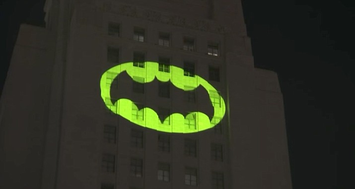 Los Angeles City Hall lights up with the Bat-Signal in tribute to "Batman" actor Adam West. During the June 16, 2017 ceremony Burt 'Robin' Ward paid tribute to his late colleague. (See video below)