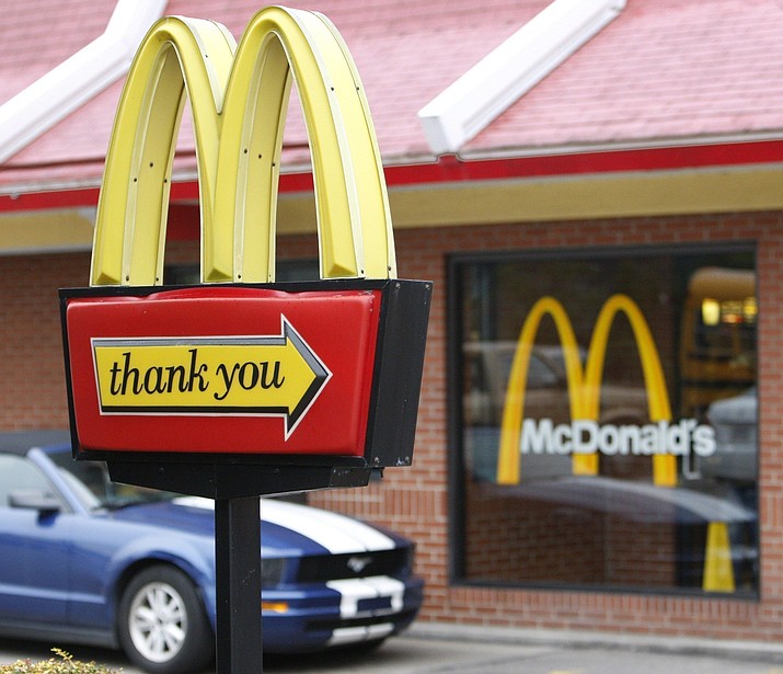 An older woman in an Indiana McDonald’s drive-thru Sunday decided to pay for the big order of a man with four children in a van behind her. The kind gesture prompted the man to pay for two cars behind him, and that generosity eventually spread to 167 cars by closing time. (Associated Press/file photo)