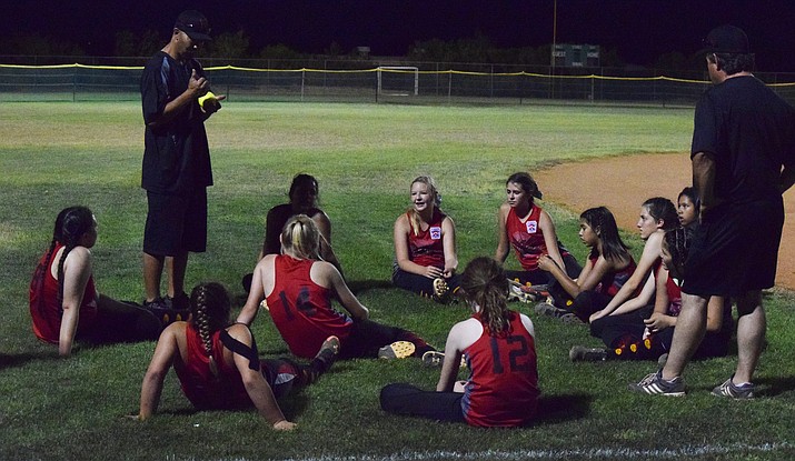 Verde Valley Little League’s majors softball all-stars meet after their 2-1 win over Williams on Friday night in Wickenburg. VVLL advanced to the district 10 championship game.  (VVN/James Kelley)