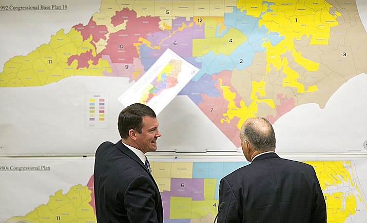 Republican state Sens. Dan Soucek, left, and Brent Jackson, right, review historical maps during The Senate Redistricting Committee for the 2016 Extra Session in the Legislative Office Building at the N.C. General Assembly, in Raleigh, N.C. (Corey Lowenstein/The News & Observer, file via AP)