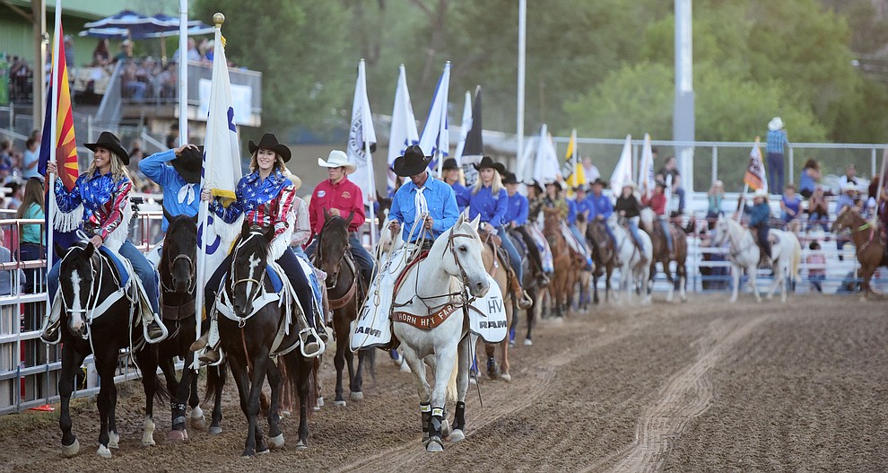 The grand entry of the opening performance of the Prescott Frontier Days Rodeo Wednesday, June 28 at the Prescott Rodeo Grounds.  (Les Stukenberg/Courier)