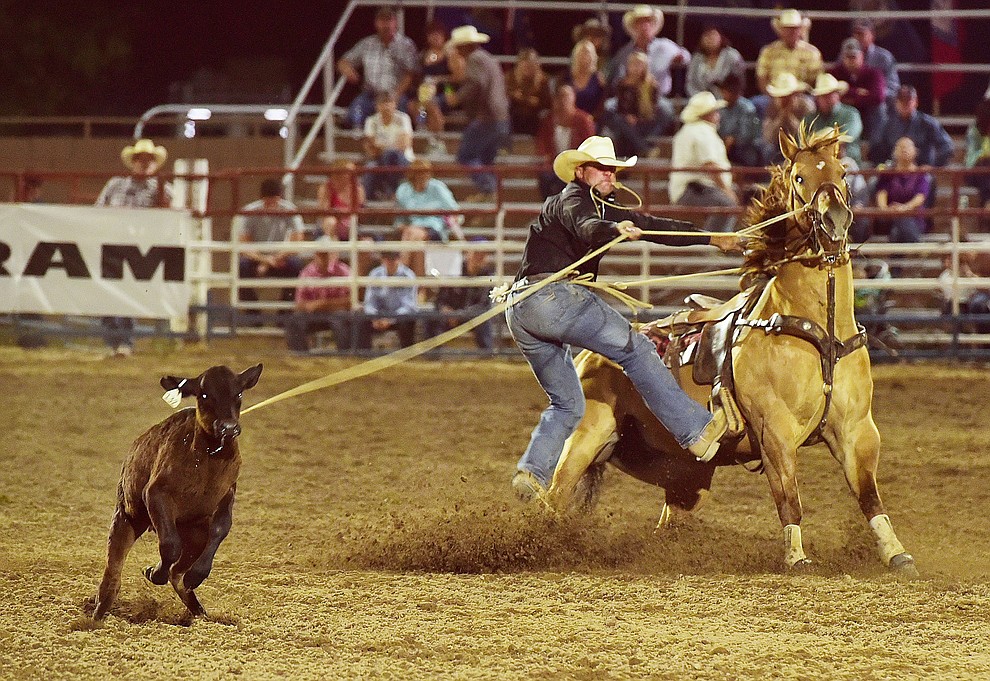 Trell Etbauer ran a 9.3 second run in the tie down roping during the opening performance of the Prescott Frontier Days Rodeo Wednesday, June 28 at the Prescott Rodeo Grounds.  (Les Stukenberg/Courier)
