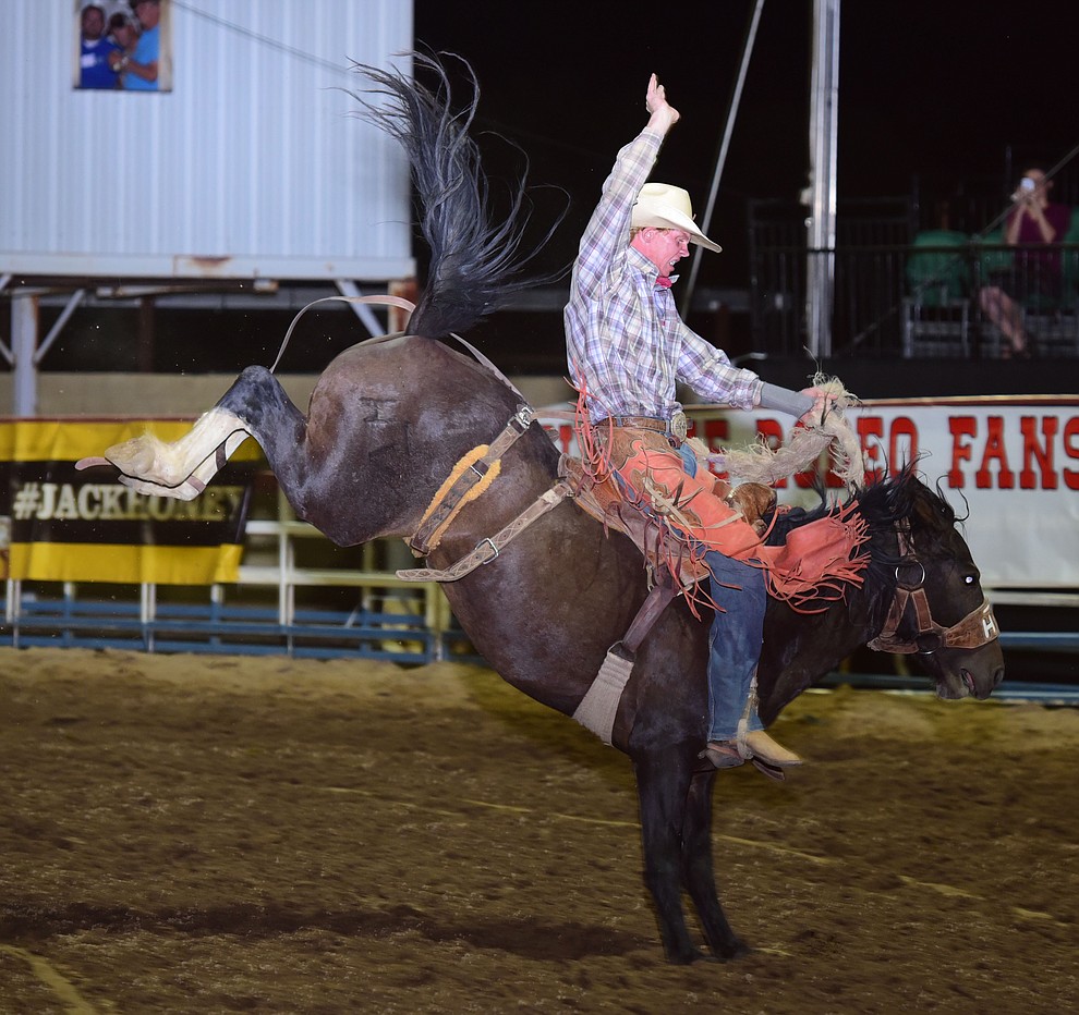Tom Knight rides Brown Sugar for a 63 in the saddle bronc during the opening performance of the Prescott Frontier Days Rodeo Wednesday, June 28 at the Prescott Rodeo Grounds.  (Les Stukenberg/Courier)