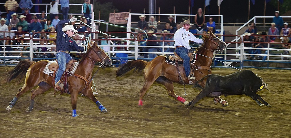 Jake Barnes and Tyler Worley had a 6.6 second run in the team roping during the opening performance of the Prescott Frontier Days Rodeo Wednesday, June 28 at the Prescott Rodeo Grounds.  (Les Stukenberg/Courier)