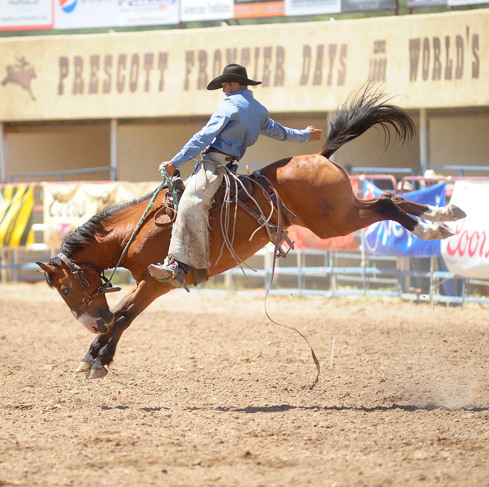 Logan Westcott scores 66 in the Cowpuncher's Ranch Bronc Riding during the 4th performance of the 2017 Prescott Frontier Days Rodeo at the Prescott Rodeo Grounds Saturday, July 1.  (Les Stukenberg/Courier)