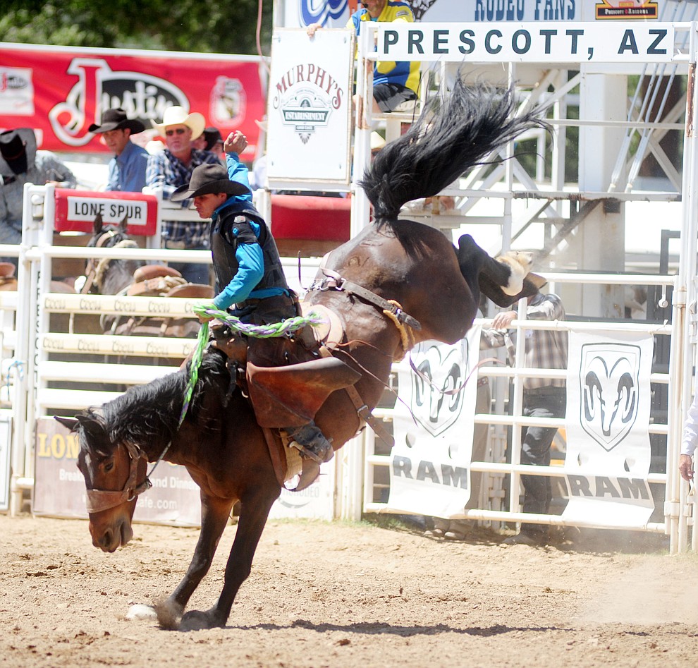 Jacob Phillips in the Cowpuncher's Ranch Bronc Riding during the 4th performance of the 2017 Prescott Frontier Days Rodeo at the Prescott Rodeo Grounds Saturday, July 1.  (Les Stukenberg/Courier)