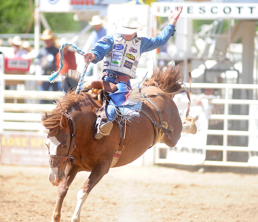 Heith DeMoss scores 78.5 on Sombrero in the Saddle Bronc during the 4th performance of the 2017 Prescott Frontier Days Rodeo at the Prescott Rodeo Grounds Saturday, July 1.  (Les Stukenberg/Courier)