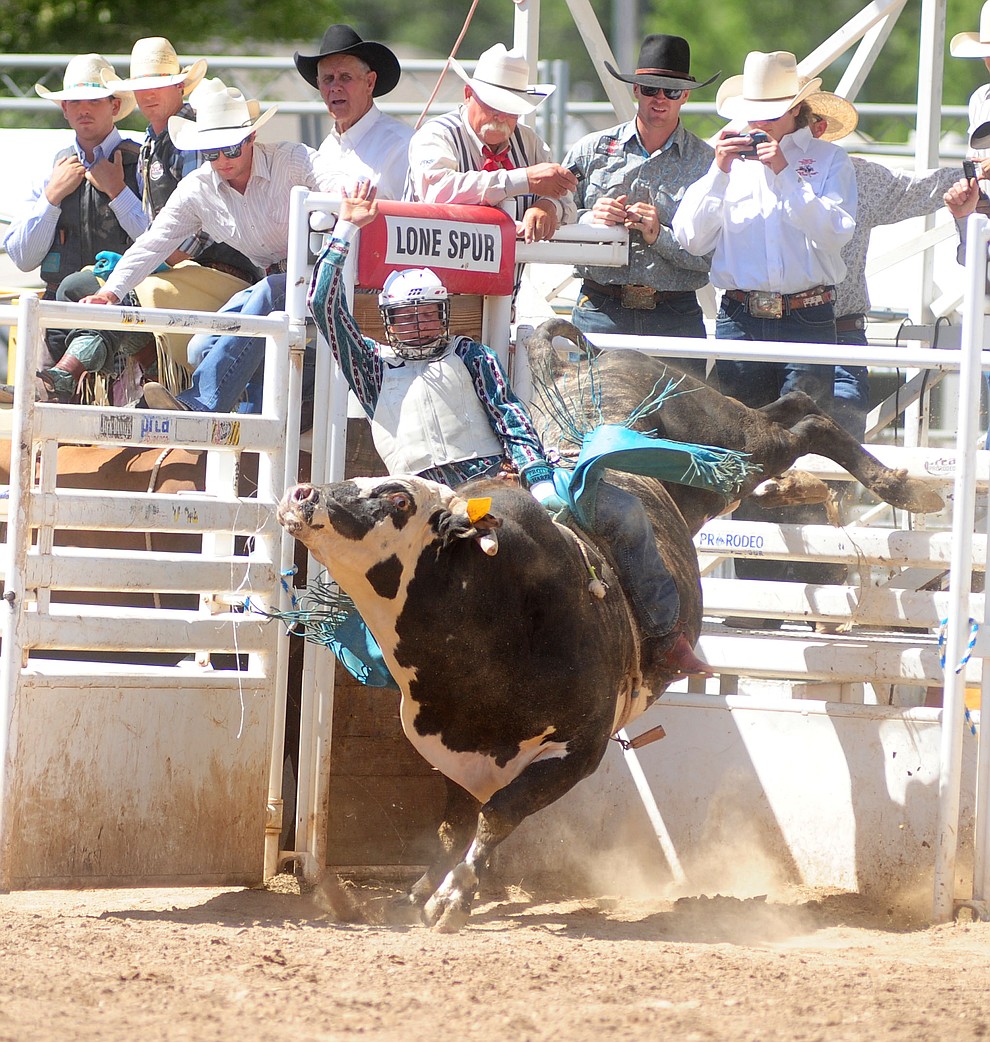 Willie Dynes looks good early  in the bull riding during the 4th performance of the 2017 Prescott Frontier Days Rodeo at the Prescott Rodeo Grounds Saturday, July 1.  (Les Stukenberg/Courier)
