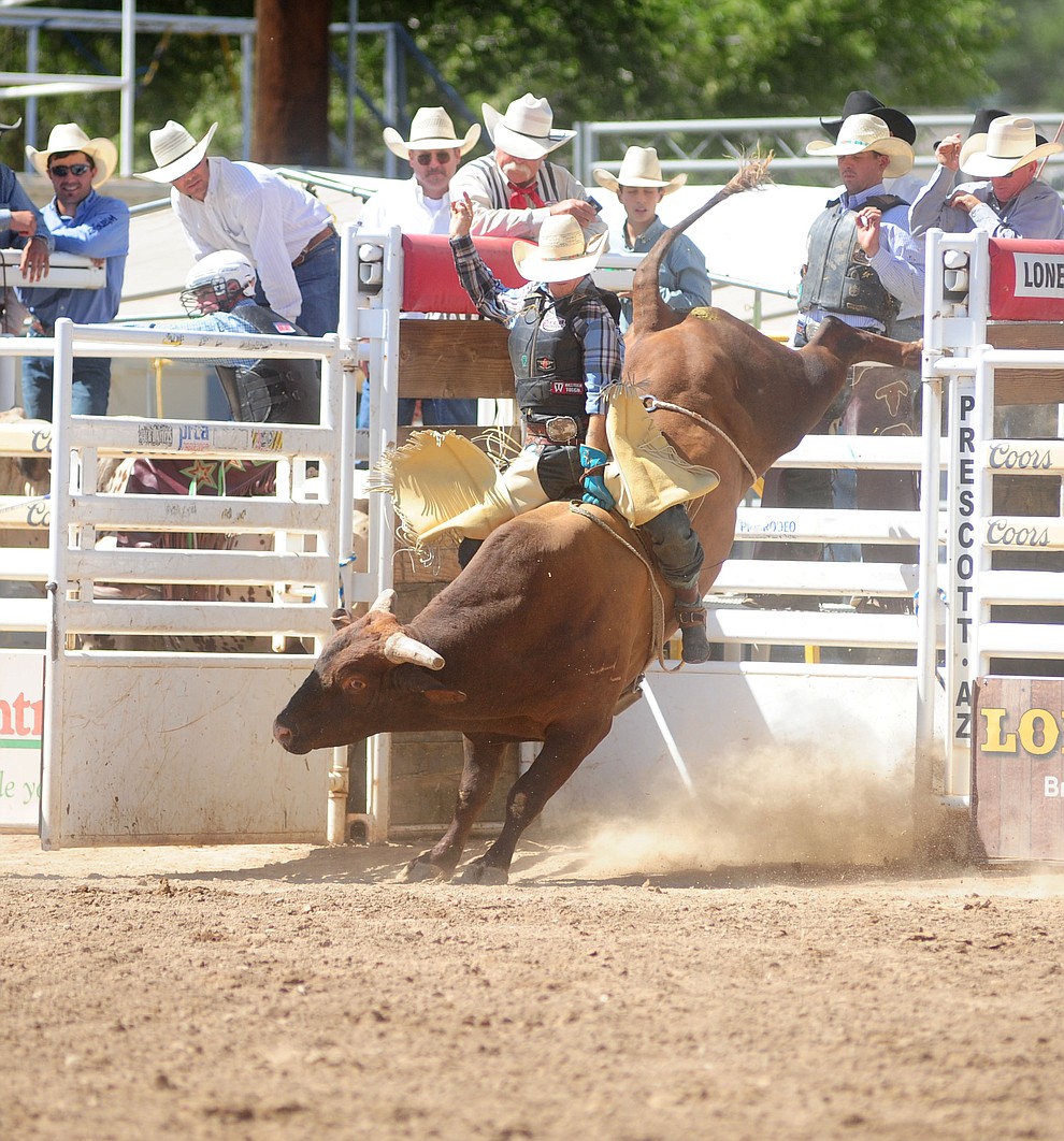 Dustin Marberry on Hot Sauce during the 4th performance of the 2017 Prescott Frontier Days Rodeo at the Prescott Rodeo Grounds Saturday, July 1.  (Les Stukenberg/Courier)