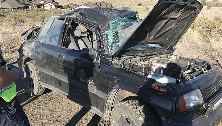 A 16-year-old driver escaped injury in this rollover Sunday because he was wearing his seat belt, officials said.