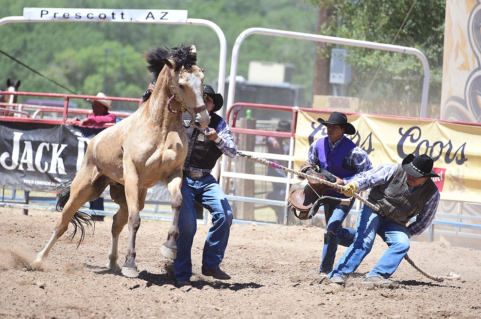 Extreme Bronc Riding during the 8th and final performance of the Prescott Frontier Days Rodeo Tuesday, July 4 at the Prescott Rodeo Grounds.  (Les Stukenberg/Courier)