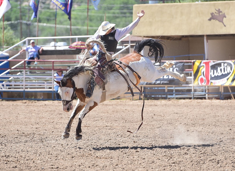 Isaac Diaz rides Painted Coast for a 79 in the saddle bronc during the 8th and final performance of the Prescott Frontier Days Rodeo Tuesday, July 4 at the Prescott Rodeo Grounds.  (Les Stukenberg/Courier)