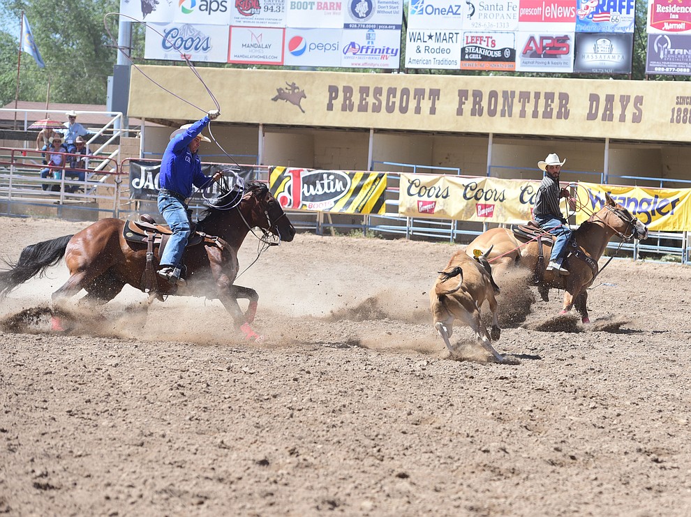 Joshua and Jonathan Torres were 6.5 seconds in the team roping during the 8th and final performance of the Prescott Frontier Days Rodeo Tuesday, July 4 at the Prescott Rodeo Grounds.  (Les Stukenberg/Courier)