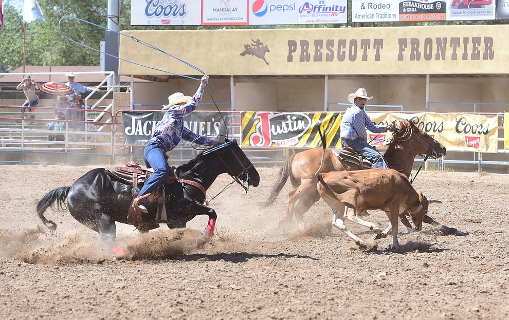 Seth Hall and Trey Yates were 6.5 seconds in the team roping during the 8th and final performance of the Prescott Frontier Days Rodeo Tuesday, July 4 at the Prescott Rodeo Grounds.  (Les Stukenberg/Courier)