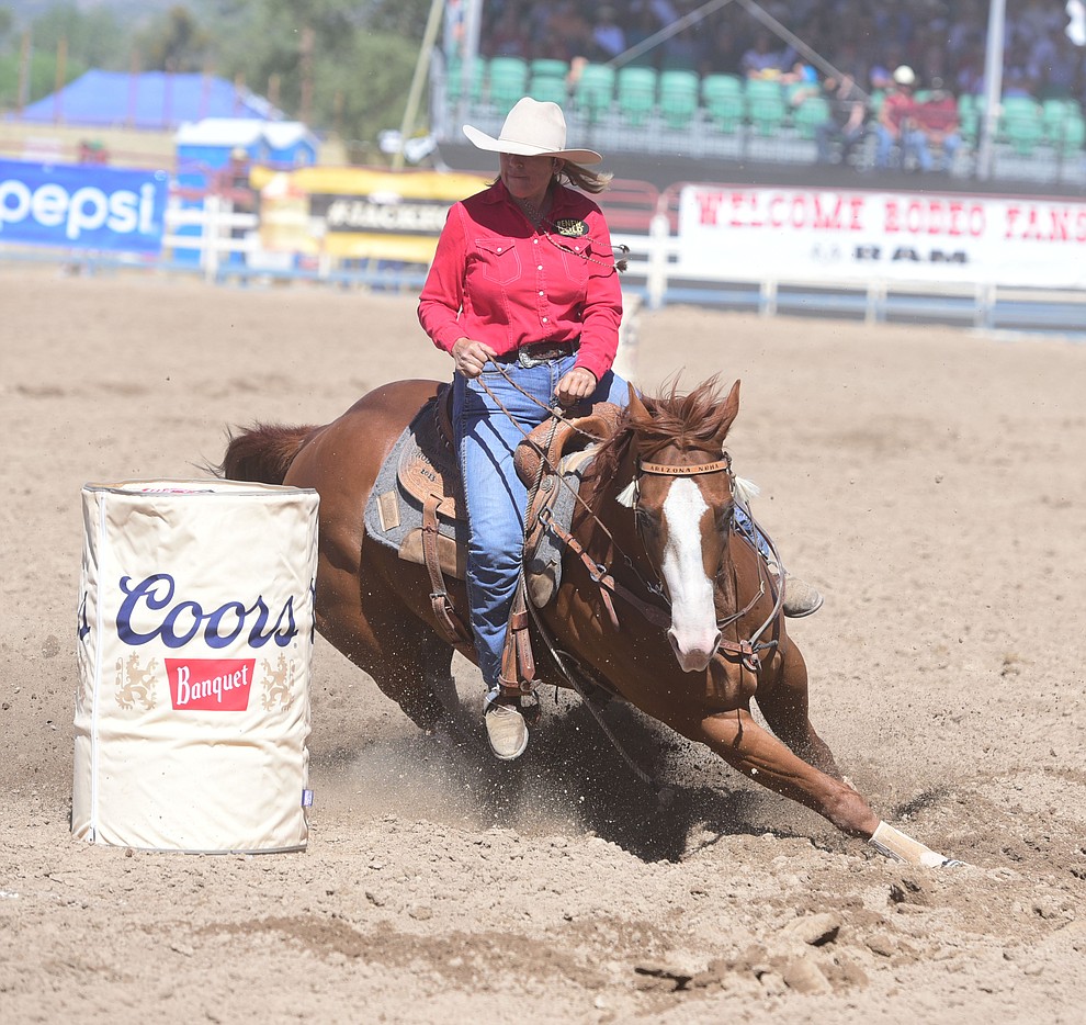 Barabara Johnson runs a 17.88 in the barrel race during the 8th and final performance of the Prescott Frontier Days Rodeo Tuesday, July 4 at the Prescott Rodeo Grounds.  (Les Stukenberg/Courier)