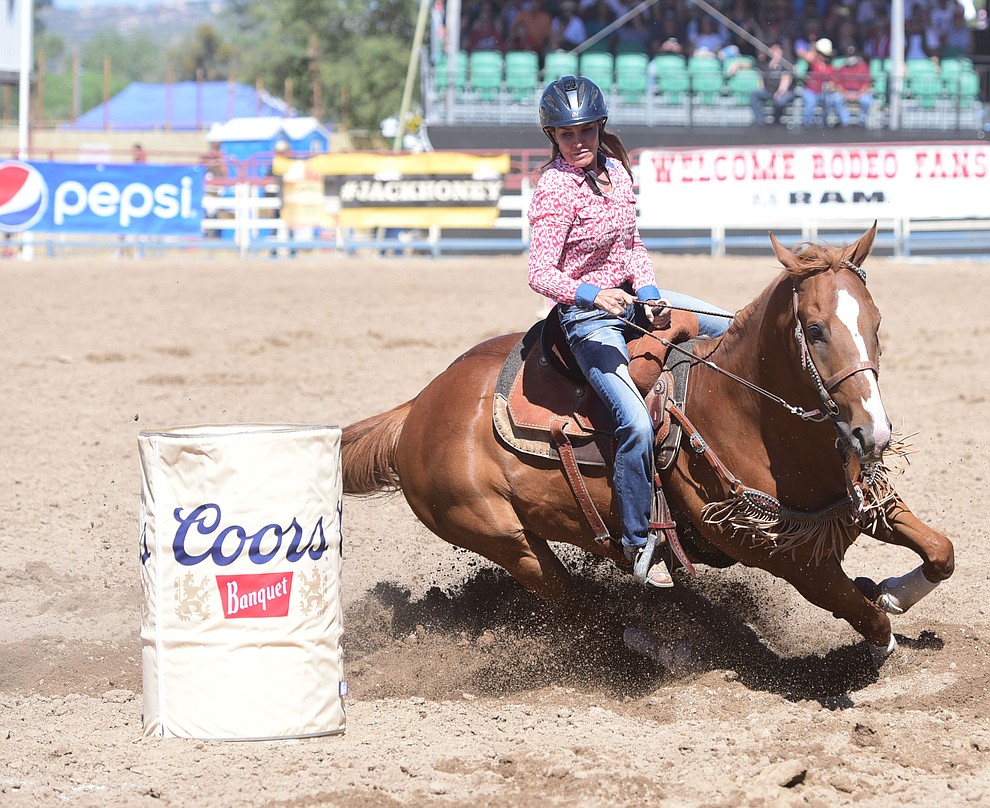 Shawna Payntier runs a 17.90 in the barrel race during the 8th and final performance of the Prescott Frontier Days Rodeo Tuesday, July 4 at the Prescott Rodeo Grounds.  (Les Stukenberg/Courier)