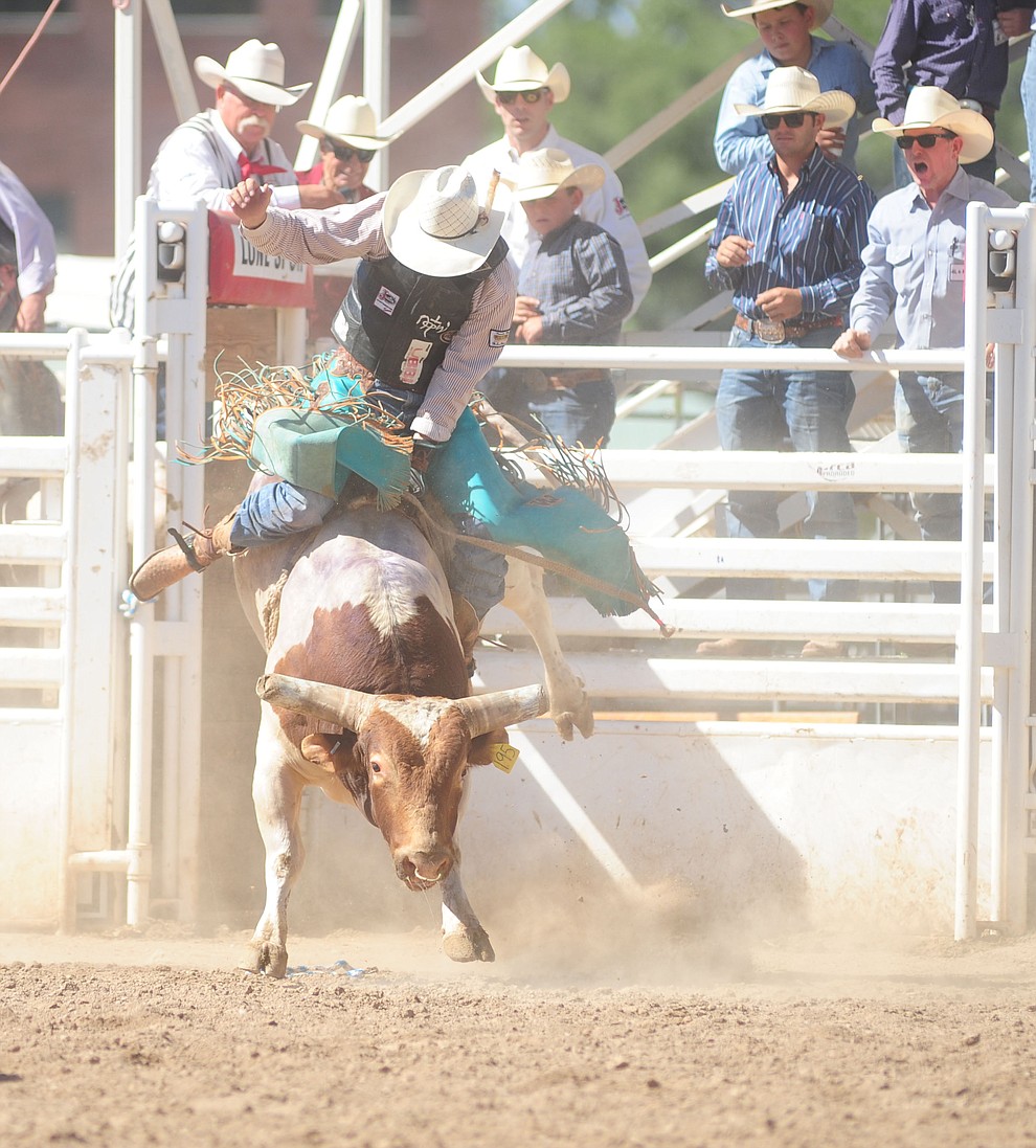 Wyatt Welsh in the bull riding during the 8th and final performance of the Prescott Frontier Days Rodeo Tuesday, July 4 at the Prescott Rodeo Grounds.  (Les Stukenberg/Courier)