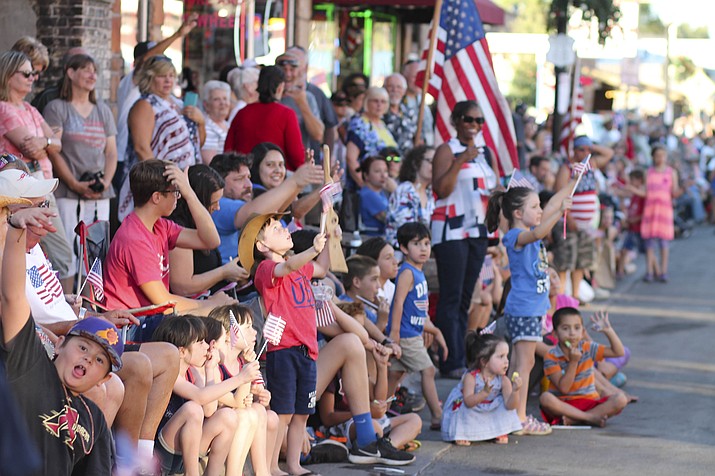 Parade attendees line Route 66 July 4. The parade had more than 50 entries this year. 