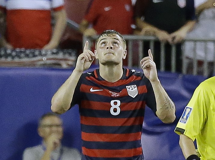 United States' Jordan Morris points upward after scoring a goal against Martinique during a CONCACAF Gold Cup soccer match, Wednesday, July 12, 2017, in Tampa, Fla. United States won 3-2. (John Raoux/AP)